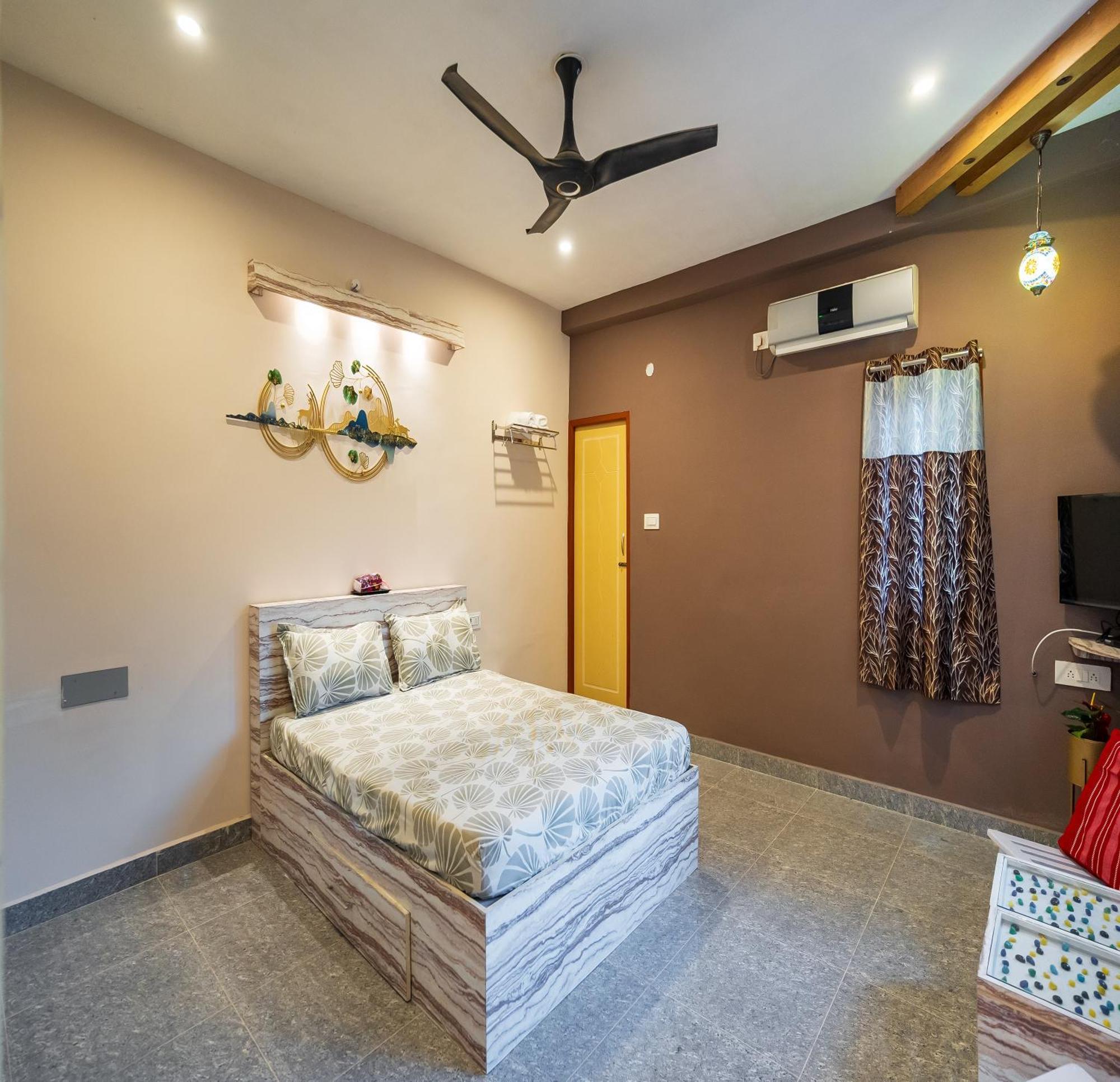 Ntr Garden Hotel Ауровил Екстериор снимка